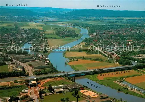 AK / Ansichtskarte Minden Westfalen Wasserstrassenkreuz und Schachtschleuse Mittellandkanal Weser Fliegeraufnahme Kat. Minden