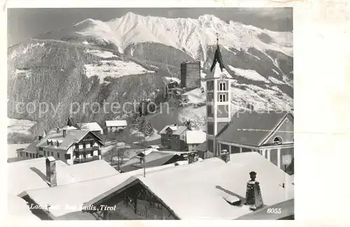 AK / Ansichtskarte Ladis Bad Ladis Bergdorf mit Kirche Winterlandschaft Alpen Kat. Ladis