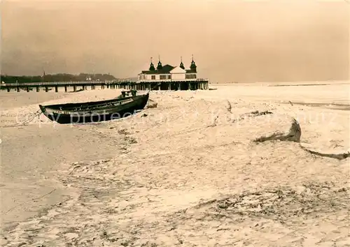 AK / Ansichtskarte Ahlbeck Ostseebad Winter an der Seebruecke Kat. Heringsdorf Insel Usedom