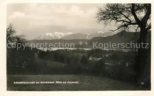 AK / Ansichtskarte Krumpendorf Woerthersee Panorama Blick auf Hochobir Karawanken