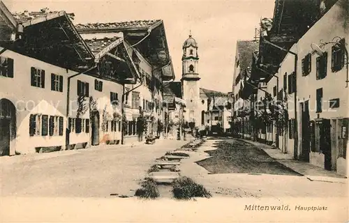 AK / Ansichtskarte Mittenwald Bayern Hauptplatz Kirche Kat. Mittenwald