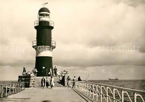 AK / Ansichtskarte Leuchtturm Lighthouse Warnemuende Mole Kat. Gebaeude