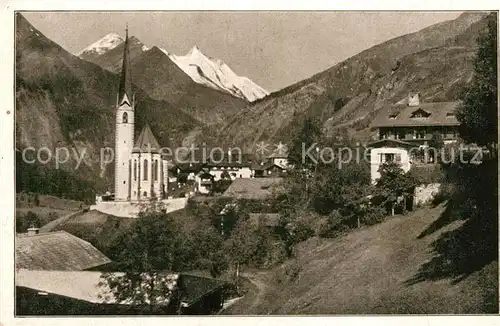 AK / Ansichtskarte Heiligenblut Kaernten Ortsansicht mit Kirche Grossglockner Hohe Tauern Kat. Heiligenblut