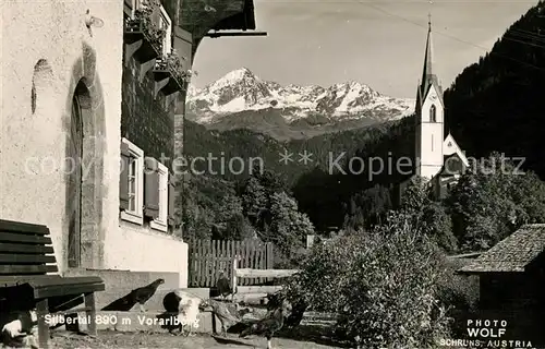 AK / Ansichtskarte Silbertal Ortsmotiv mit Kirche Alpenblick Kat. Silbertal