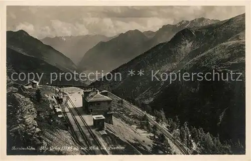 AK / Ansichtskarte Alp Gruem Berninabahn Bergbahn mit Blick ins Puschlavtal Alpenpanorama Kat. Alp Gruem