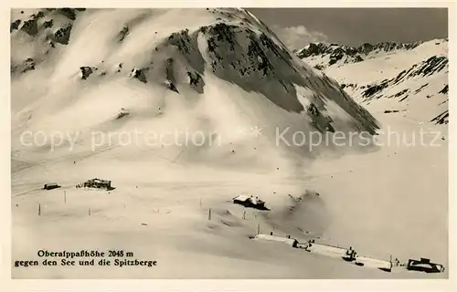 AK / Ansichtskarte Oberalppass gegen See und Spitzberge Winterlandschaft Alpen Kat. 