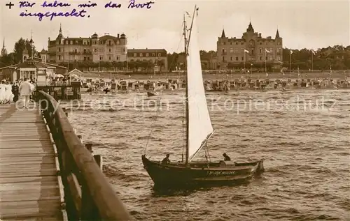 AK / Ansichtskarte Zinnowitz Ostseebad Seebruecke Blick zum Strand Segelboot
