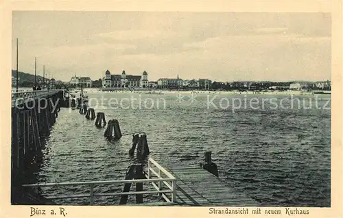 AK / Ansichtskarte Binz Ruegen Strandansicht mit neuem Kurhaus Seebruecke Kat. Binz