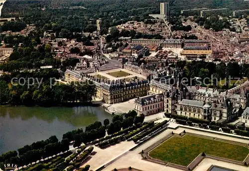 AK / Ansichtskarte Fontainebleau Seine et Marne Fliegeraufnahme Palais Fontaine Tour Warnery Kat. Fontainebleau