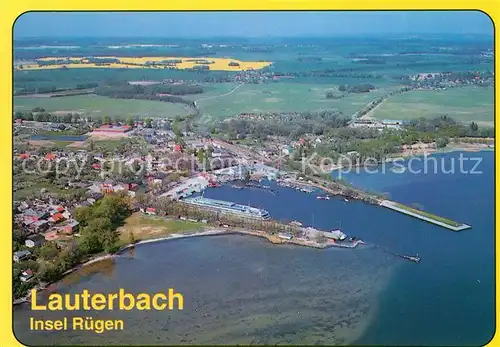 AK / Ansichtskarte Lauterbach Ruegen Fliegeraufnahme mit Hafen Kat. Putbus