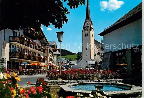 AK / Ansichtskarte Abtenau Kirche Brunnen Kat. Abtenau