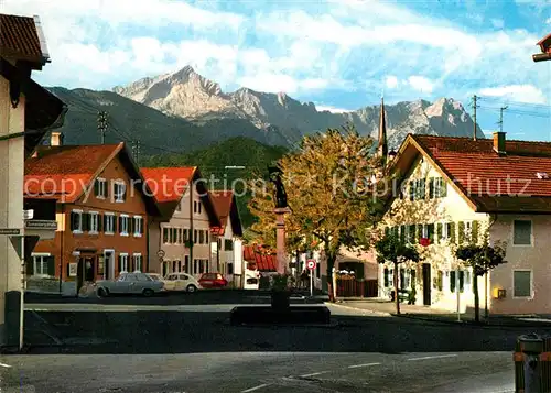AK / Ansichtskarte Garmisch Partenkirchen Floriansbrunnen Kat. Garmisch Partenkirchen