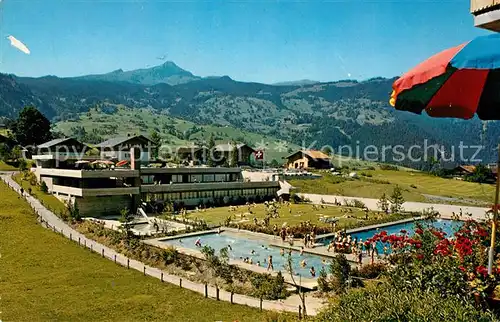 AK / Ansichtskarte Grindelwald Gartenbad Hellbach Freibad mit Tschuggen und Maennlichen Berner Alpen Kat. Grindelwald