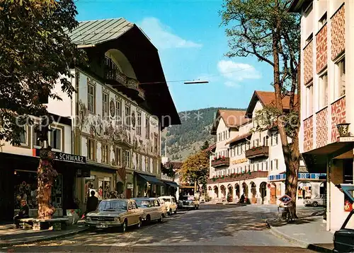 AK / Ansichtskarte Oberammergau Dorfstra&#223;e Geburtshaus Ludwig Thoma Hotel Wittelsbach Kat. Oberammergau