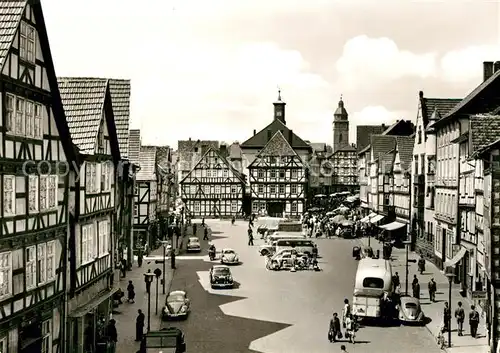 AK / Ansichtskarte Eschwege Marktplatz mit altem Rathaus Fachwerkhaeuser Altstadt Kat. Eschwege