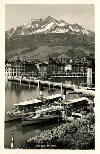 AK / Ansichtskarte Luzern Vierwaldstaettersee Bootsanleger Dampfer Bruecke Blick zum Pilatus