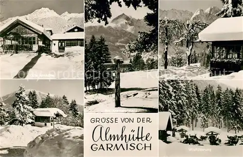 AK / Ansichtskarte Garmisch Partenkirchen Almhuette Wildfuetterung Winterlandschaft Alpen Kat. Garmisch Partenkirchen