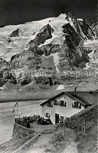 AK / Ansichtskarte Hofmannshuette Berghaus mit Grossglockner Hohe Tauern Kat. Heiligenblut Kaernten