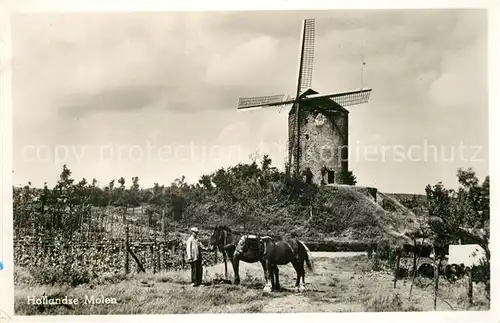 AK / Ansichtskarte Windmuehle Holland Pferde  Kat. Gebaeude und Architektur