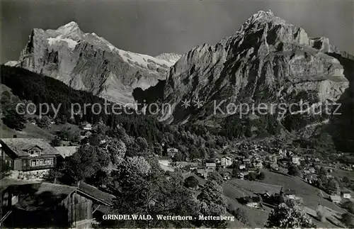 AK / Ansichtskarte Grindelwald Gesamtansicht mit Wetterhorn Mettenberg Berner Alpen Kat. Grindelwald