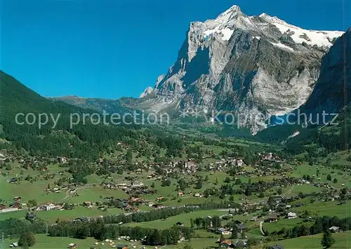 AK / Ansichtskarte Grindelwald mit Wetterhorn Berner Alpen Fliegeraufnahme Kat. Grindelwald