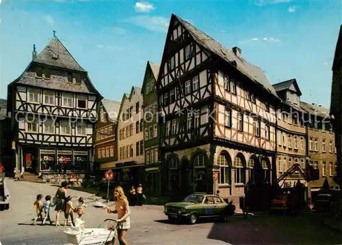 AK / Ansichtskarte Wetzlar Eisenmarkt mit Wertherhaus und Alte Muenz Kat. Wetzlar