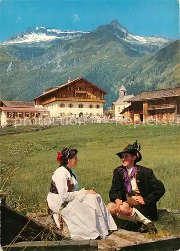 AK / Ansichtskarte Matrei Osttirol Tauernhaus Grossveniger Paar in Tracht Kat. Matrei in Osttirol