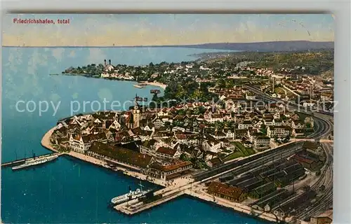 AK / Ansichtskarte Friedrichshafen Bodensee Fliegeraufnahme Hafenbahnhof Kirche Kat. Friedrichshafen