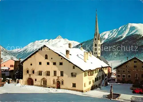 AK / Ansichtskarte Zuoz GR Ortsmotiv mit Kirche Alpen Winterpanorama Kat. Zuoz