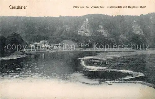 AK / Ansichtskarte Carlshafen Blick von der Weserbruecke mit Hugenottenturm Kat. Bad Karlshafen