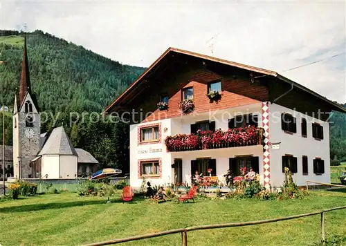 AK / Ansichtskarte Montal St Lorenzen Pension Gaestehaus Garni Emma Kirche Kat. Pustertal