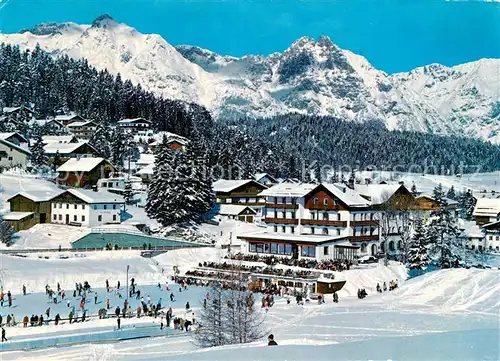 AK / Ansichtskarte Seefeld Tirol Wintersportplatz Hotel Wetterstein gegen Wettersteingebirge Winterpanorama Kat. Seefeld in Tirol