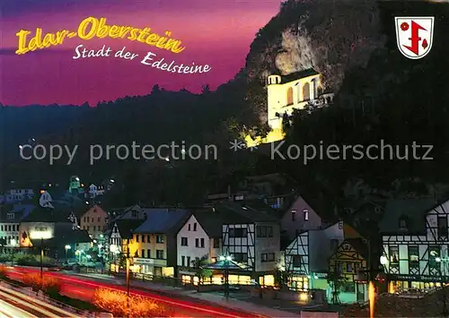 AK / Ansichtskarte Idar Oberstein Stadt der Edelsteine Blick zur Felsenkirche Nachtaufnahme Kat. Idar Oberstein