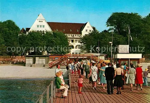 AK / Ansichtskarte Gluecksburg Ostseebad Blick vom Schiffsanleger zum Matthias Claudius Heim Kat. Gluecksburg (Ostsee)