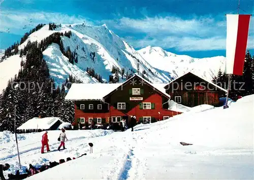 AK / Ansichtskarte Baad Mittelberg Kleinwalsertal Starzelhaus mit Unspitz Hochstarzel Berghaus Wintersportplatz Alpen Kat. Mittelberg