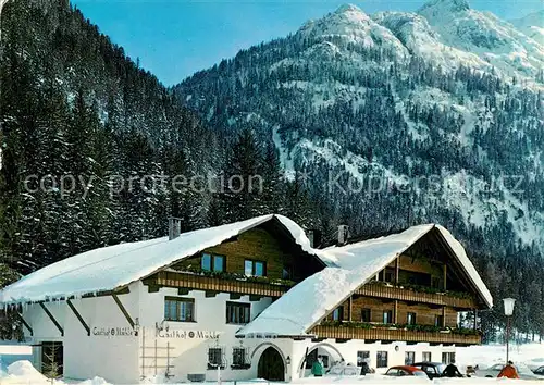 AK / Ansichtskarte Unterleutasch Gasthof Muehle Winterlandschaft Alpen Kat. Leutasch Tirol