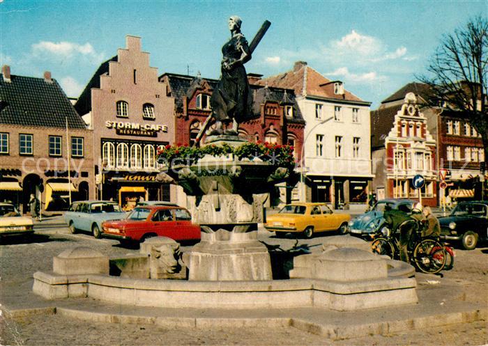 AK / Ansichtskarte Husum Nordfriesland Markt Denkmal Tine Storm Cafe