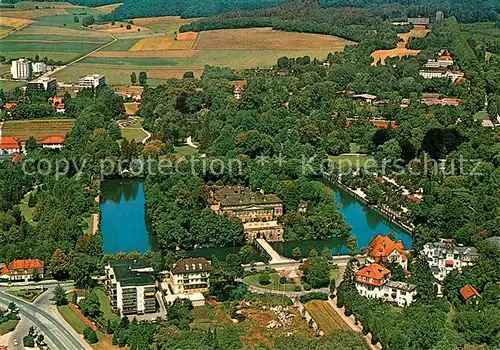 AK / Ansichtskarte Pyrmont Bad Fliegeraufnahme Schloss Sanatorium Bomberg Kat. Bad Pyrmont