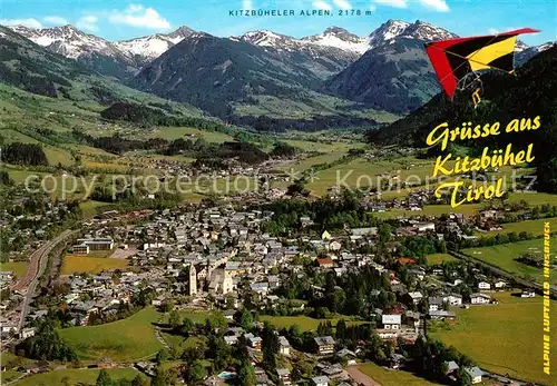 AK / Ansichtskarte Kitzbuehel Tirol Fliegeraufnahme Kirche Panorama Alpen Kat. Kitzbuehel