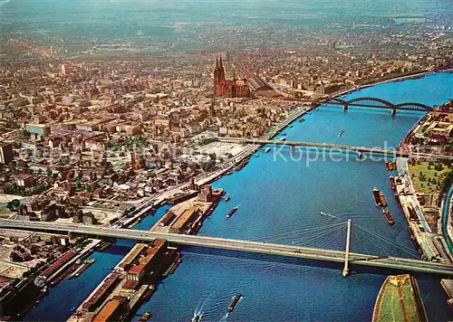 AK / Ansichtskarte Koeln Rhein Altstadt mit Dom Severinsbruecke Deutzer Bruecke Hohenzollernbruecke Fliegeraufnahme Kat. Koeln