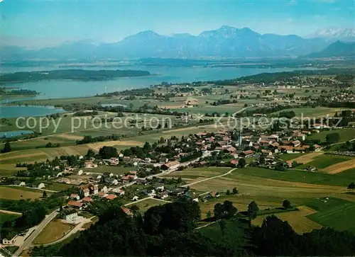 AK / Ansichtskarte Rimsting mit Blick auf Chiemsee und Hochgern Alpen Fliegeraufnahme Kat. Rimsting Chiemsee