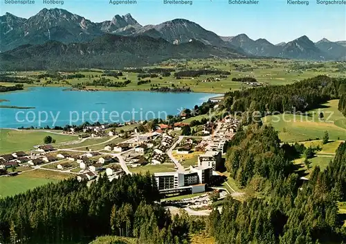 AK / Ansichtskarte Hopfen See Kurhotel Kurklinik mit Enzensberg Alpenpanorama Fliegeraufnahme Kat. Fuessen