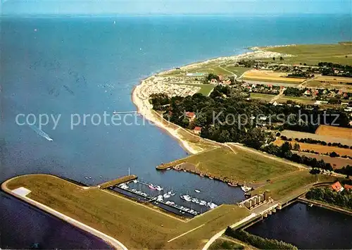 AK / Ansichtskarte Dangast Nordseebad Hafen Schleuse Fliegeraufnahme DangaNordseebad