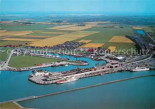 AK / Ansichtskarte Norden Ostfriesland Norddeich Fliegeraufnahme mit Hafen Norden Ostfriesland Kat. Norden