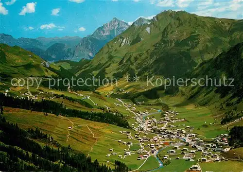 AK / Ansichtskarte Lech_Vorarlberg mit Biberkopf und Mittagspitze Alpenpanorama Fliegeraufnahme Lech Vorarlberg Kat. Lech