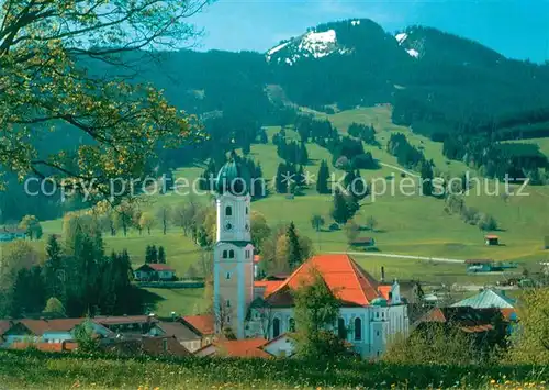 AK / Ansichtskarte Nesselwang Ortsansicht mit Kirche Allgaeuer Alpen Nesselwang Kat. Nesselwang