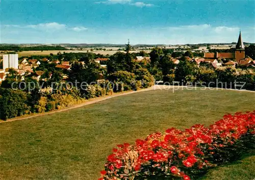 AK / Ansichtskarte Luetjenburg_Holstein Ortsansicht mit Kirche Blumenbeet Luetjenburg_Holstein Kat. Luetjenburg