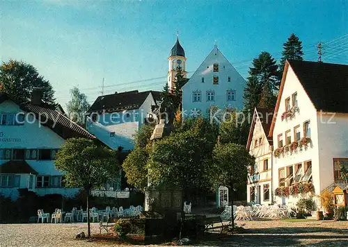 AK / Ansichtskarte Bad_Groenenbach Marktplatz Brunnen Strassencafe Blick zur Kirche Bad_Groenenbach Kat. Bad Groenenbach
