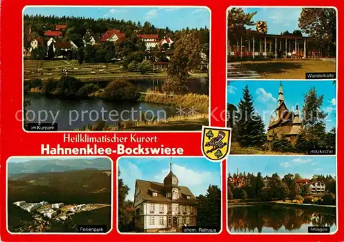 AK / Ansichtskarte Hahnenklee Bockswiese_Harz Kurpark See Wandelhalle Holzkirche ehemaliges Rathaus Ferienpark Fliegeraufnahme Hahnenklee Bockswiese