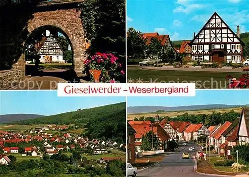 AK / Ansichtskarte Gieselwerder Ehemaliger Burghof Torbogen Fachwerkhaus Hauptstrasse Panorama Gieselwerder